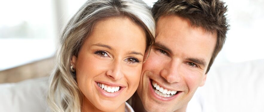 woman and man with good vision after its restoration